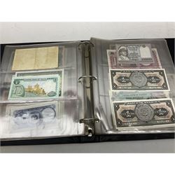 World banknotes, including Queen Elizabeth II The States of Jersey one pound 'DB202703', five pounds 'BB527762' and ten pounds 'AB651481', reserve bank of New Zealand two dollars '1L3 741894', King George V Straits Settlements one dollar 1st January 1935 'F/83 28924', various Bank of England notes etc, housed in two ring binder albums