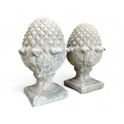 Pair of cast stone garden pineapple gatepost or wall top finials, on square base