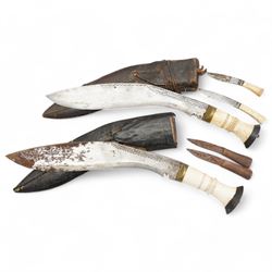 Nepalese Kukri with engraved blade and two skinning knives with bone handles in leather scabbards and another similar (2)