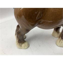 Three Beswick models comprising Hereford Bull no 949, 'CH Cutmil Cupie' Pug, and bay Shire horse, all with printed marks beneath