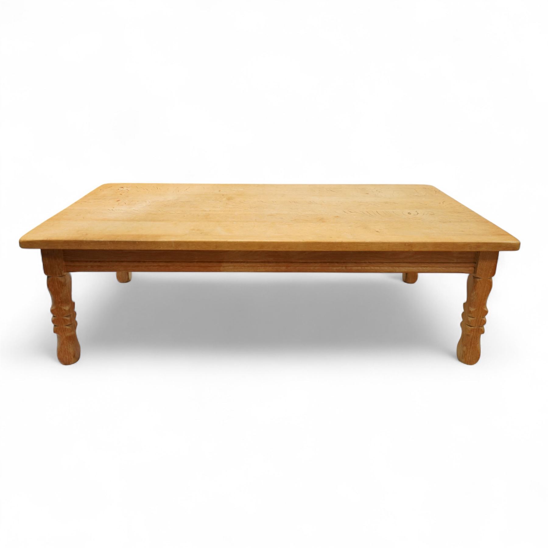 Mid-20th century light oak coffee table, retailed by Danish Homestores, Nottingham, rectangular top with prominent grain figuring, raised on turned supports