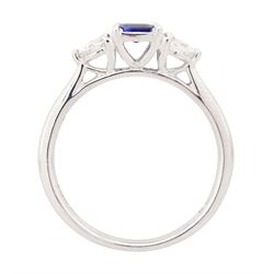 Platinum sapphire and diamond three stone ring, single emerald cut sapphire of approx 0.70 carat, either side set with two round brilliant cut diamonds, hallmarked, total diamond weight approx 0.50 carat