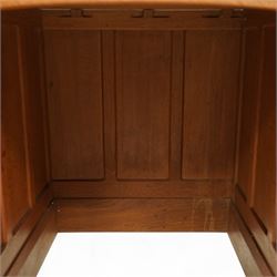 Mouseman - oak pedestal kneehole desk, adzed rectangular top over twin pedestals each fitted with three drawers, arched kneehole with panelled interior, on plinth base, signature carved mouse to side, by the workshop of Robert Thompson, Kilburn