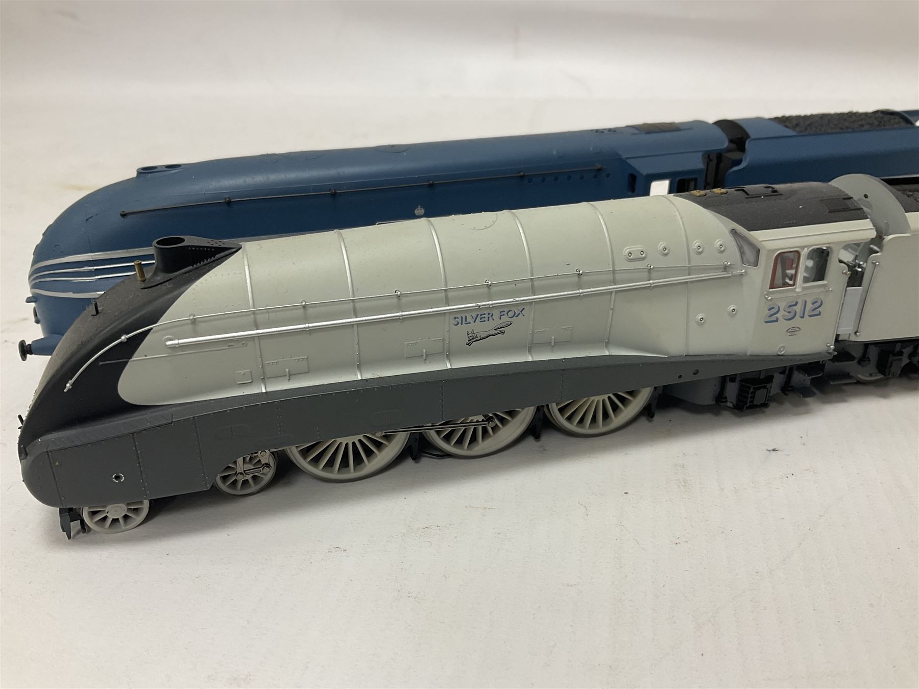 Hornby ‘00’ gauge - Class A4 4-6-2 locomotive ‘Silver Fox’ no.2512 in LNER silver; Princess Coronation Class 4-6-2 locomotive ‘Coronation’ no.6220 in LMS blue; both unboxed (2)