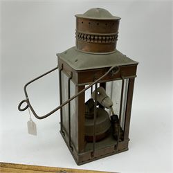 Four beech newspaper holders, each with spring loaded split and pinned blade, turned handle and suspension hook, longest 80cm; two copper powder flasks; and a copper square section lantern with oil burner (7)