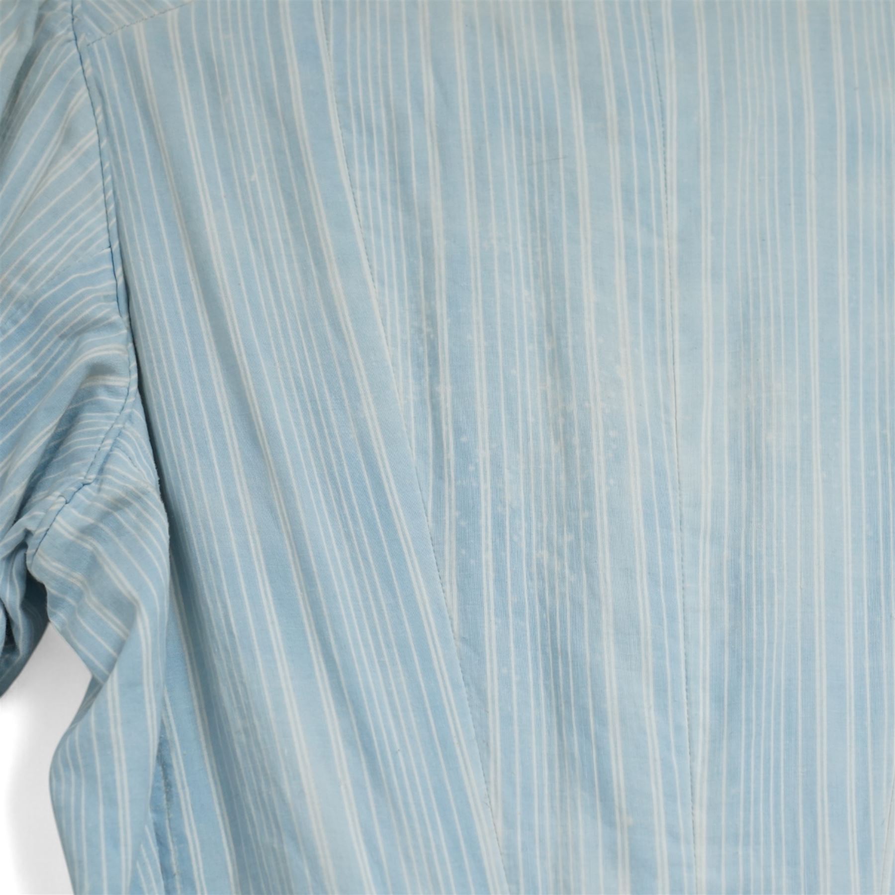 Victorian ladies button-down bodice and skirt, in blue and white striped fabric with pleated detailing, the skirt with gathered bustle back