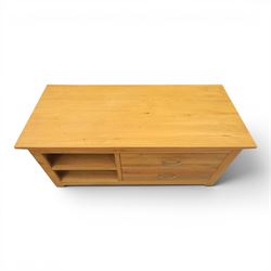 Contemporary light oak television or media unit, two drawers and two open shelves, with apertures for wires