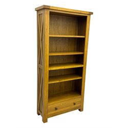 Oak Furnitureland, golden oak open bookcase fitted with single drawer