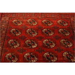 Persian Bokhara red ground rug, decorated with Guls, 255cm x 166cm  