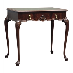  20th century mahogany writing table, moulded top with inset tooled leather top, single frieze drawer, on cabriole legs with shell carved knees, labelled and lock stamped for 'Waring & Gillows Ltd Lancaster', W77cm, H73cm, D50cm   