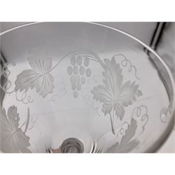 Set of three 18th century style wine glasses, each with funnel bowl etched with fruit vine, upon a double series air twist stem and circular foot, H17cm