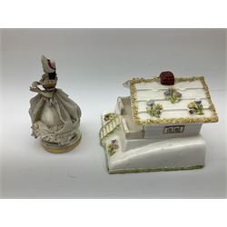 Group of figures, comprising six Royal Doulton examples, Daydreams HN1731, Silks and Ribbons HN2017, Tom Sawyer HN2926, Marie HN1370, Bo-Peep HN1811, and Tinkle Bell HN1677, together with a Dresden type 'lace' example, and a Coalport 'Swiss Cottage', (8)