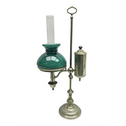 William H Honey polished brass adjustable student's oil lamp, with green glass shade, H60cm
