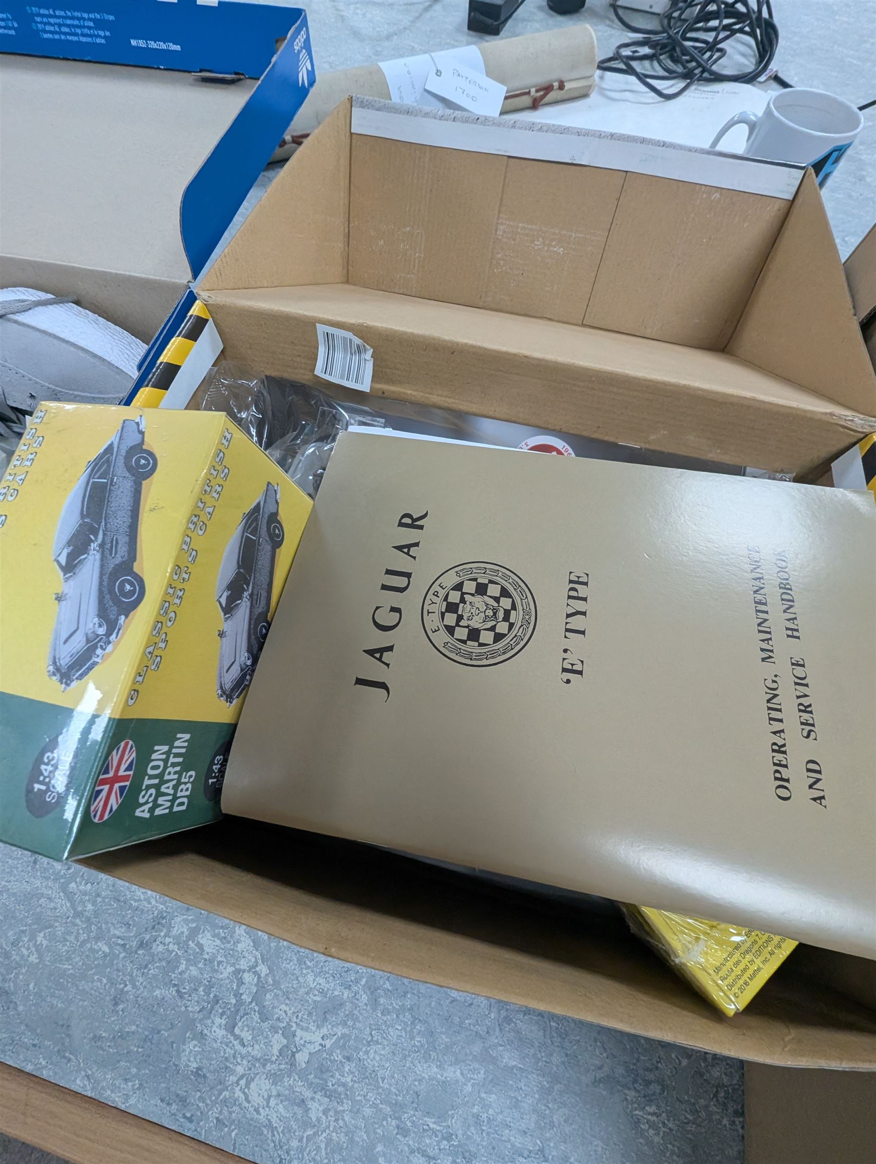 Pair of men's Adidas Samba trainers, Iron Maiden Trooper Beer, three DeAgostini Jaguar E Type magazines and a collection of costume jewellery