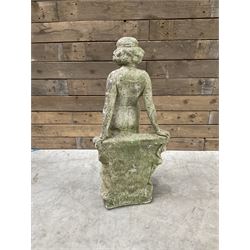 Pair of cast stone garden dogs and 2 female figures,