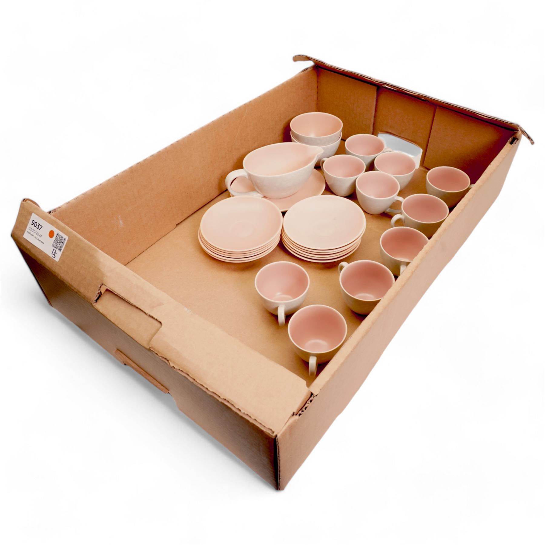 Poole pottery Twintone seagull and peach part coffee service, comprising ten cups and twelve saucers, two sugar bowls and a cream jug and stand