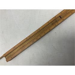 Late 18th/early 19th century boxwood ruler with four slides, for use by Customs &. Excise in the brewery trade; scales on all four sides each having a central slide with divisions on either side;  possibly made by 'E. Roberts, Dove Court, Old Jewry, London' (Edward Roberts (I) 1749-1776 & Edward Roberts (II) 1788-1795) L30.5cm