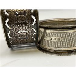 Two silver napkin rings, silver spoon with thistle top terminal, two silver handled butter knives, and small glass jar with silver cover, all hallmarked, approximate weighable silver 53.7 grams