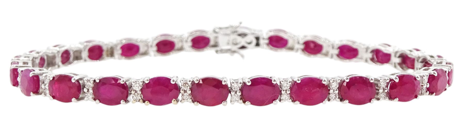 18ct white gold oval cut ruby and round brilliant cut diamond bracelet, stamped 750, total ruby weight 12.70 carat, total diamond weight 0.46 carat