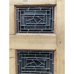 Early 20th century pine six panel door with later stained glass panels