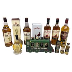 Two bottles of The Famous Grouse blended Scotch whisky, three bottles of Bell's blended Scotch whisky, Grants blended Scotch whisky and various miniature whiskys and gift sets, of various contents and proof  