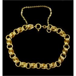 18ct gold fancy twist link bracelet, stamped 750