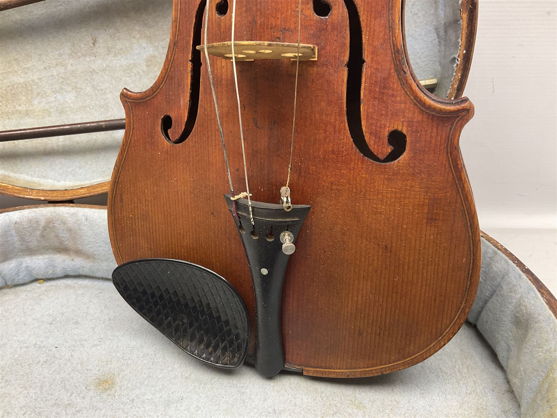 Mid-19th century German violin with 36cm two-piece maple back and ribs and spruce top, bears label 'Riccardo Antoniazzi Cremonese fece in Milano l'anno 1896' L59.5cm overall; in walnut case with two part bows