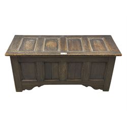 18th century design oak coffer, four panel hinged lid over four panel front, panelled sides, on stile supports with shaped brackets 
