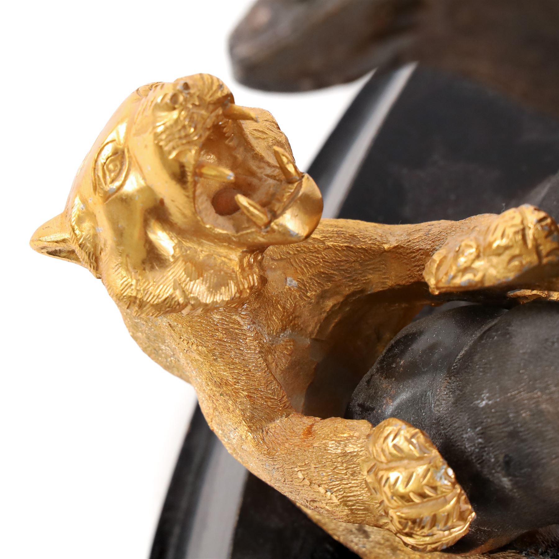After Genryusai Seiya, modern bronzed model of an elephant being hunted by tigers, upon a black painted wooden base, height including base H45cm
