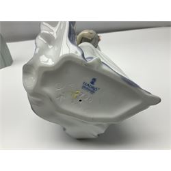 Three Lladro figures of ladies comprising 'The Flirt' model no 5789, 'Ingenue' model no 5487 and 'Carefree' model no 5790, all with boxes