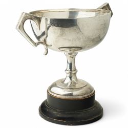  'Bramham Moor Hunt Point to Point Steeplechases' - A two handled silver cup presented by H.R.H. The Princess Royal on ebonised plinth D23cm x H23cm excluding plinth, Birmingham 1931 Maker William Hutton & Sons Ltd