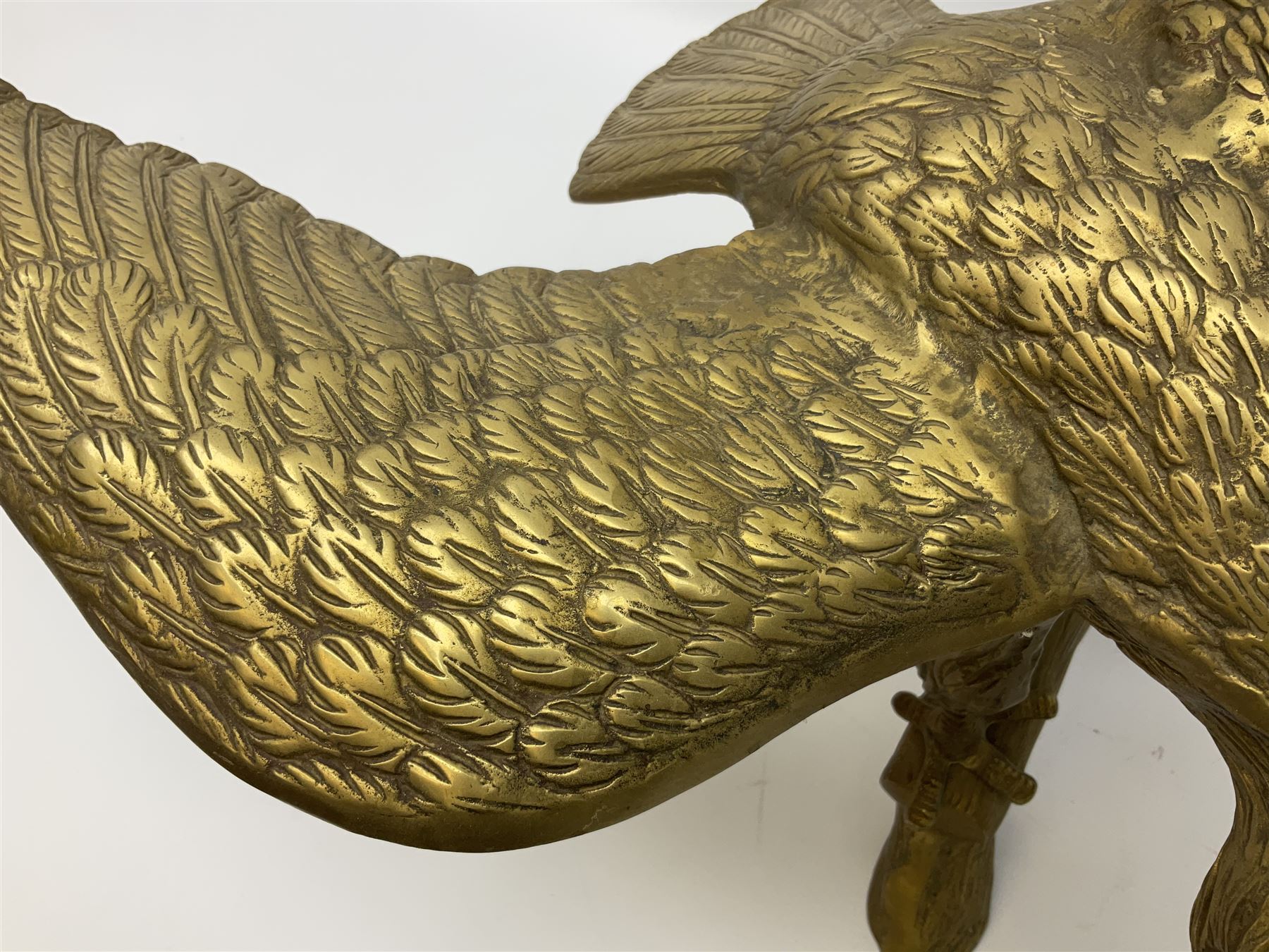 Large brass figure of an eagle on a branch, H51.5cm