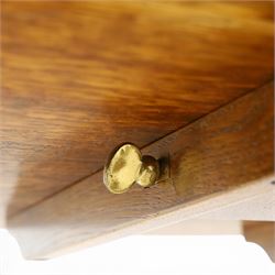 Traditional design golden oak tilt-top tripod table, brass fittings, turned baluster column on splayed supports