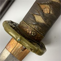 WW2 Japanese Army officer's shin gunto/katana sword with 68.5cm steel single edged blade, foliate cast brass tsuba, bound fish-skin grip with brass mounts, inscribed marks to both sides of tang; in lacquered wooden scabbard with brass mounts and locking button L97cm overall