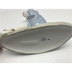 Lladro figure, Holy Night, modelled as Mary kneeling over baby Jesus, sculpted by Vincente Martinez, with original box, no 5796, year issued 1991, year retired 1994, H22cm