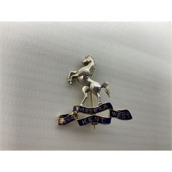 Royal West Kent regiment 9ct gold and enamel sweetheart brooch; The Queens Own regiment silver and enamel sweetheart brooch; and another sweetheart brooch for the Royal West Kent regiment (3)