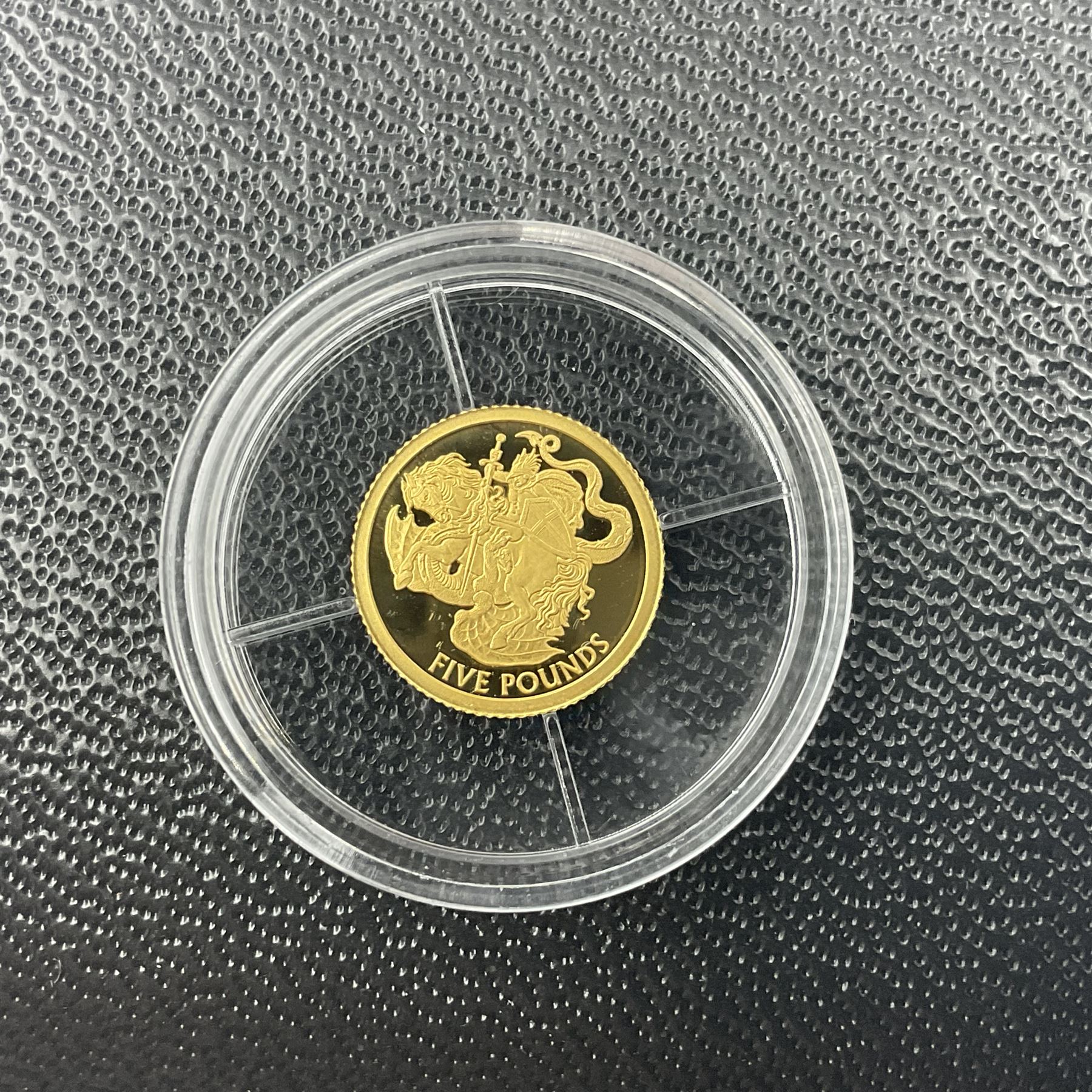 Eleven Queen Elizabeth II miniature gold coins, each being 0.5 grams of 24 carat gold, including Tristan da Cunha 2020 'Laurel', Solomon Islands 2020 '80th Anniversary of the Battle of Britain' etc, all with certificates