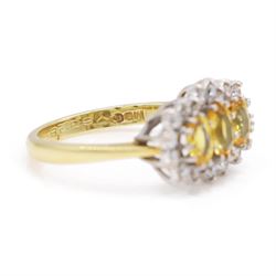 18ct gold yellow sapphire and diamond cluster ring, three oval cut sapphires, surrounded by twenty round brilliant cut diamonds, London 1988, total sapphire weight approx 1.15 carat, total diamond weight approx 0.50 carat