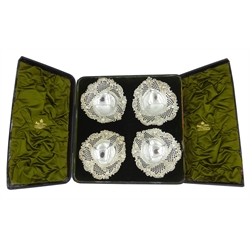  Four Victorian silver heart shaped bon bon dishes, embossed and pierced decoration by Sibray, Hall & Co, London 1894, retailed by Mappin & Webb cased, approx 12.2oz  