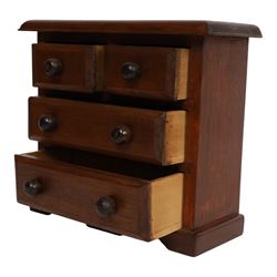 Table top chest of draws, fitted with three draws, upon a skirt base, together with another table top chest 