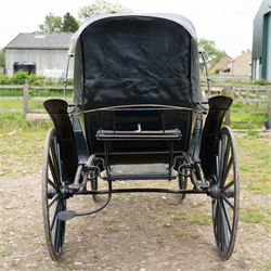 George IV Phaeton Carriage by Mills, Paddington, London

A George IV four wheeled phaeton carriage by Mills, Paddington, London, the hubs stamped accordingly, with black painted bodywork, folding black leather hood, upholstered passenger compartment and rear luggage platform. The carriage is fitted with wooden spoked wheels, yellow coachlining, leaf spring suspension, front mudguards, metal footrests and shafts for single horse use. In original condition by one of the best carriage builders of the day

Features

• Maker’s hubs marked Mills, Paddington, London
• Four wheeled phaeton carriage
• Black painted bodywork with fine yellow coachlining
• Folding black leather hood
• Button upholstered passenger seating
• Rear luggage platform with rail
• Wooden spoked wheels with rubber tyres
• Leaf spring suspension
• Shafts for single horse use
• Front mudguards and metal footrests
• Fitted with a side mounted ratchet hand brake operating on the rear wheel


Dimensions:
Overall length: 305 cm
Width: 160 cm
Height: 213 cm

Wheel Diameters:
Front wheels: 77 cm
Rear wheels: 107 cm

Seating:
Driving seats: 1
Passenger seats: 2