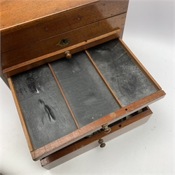  Dentistry - Late Victorian mahogany Dentists cabinet by C. Ash & Co, hinged cover above six long graduated drawers, enclosing a comprehensive arrangement of implements, pharmaceutical bottles, tools, modelling wax, porcelain teeth, 