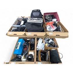 Collection of photography equipment, including flashes, hoods, filters, telephoto lens, bags, etc
