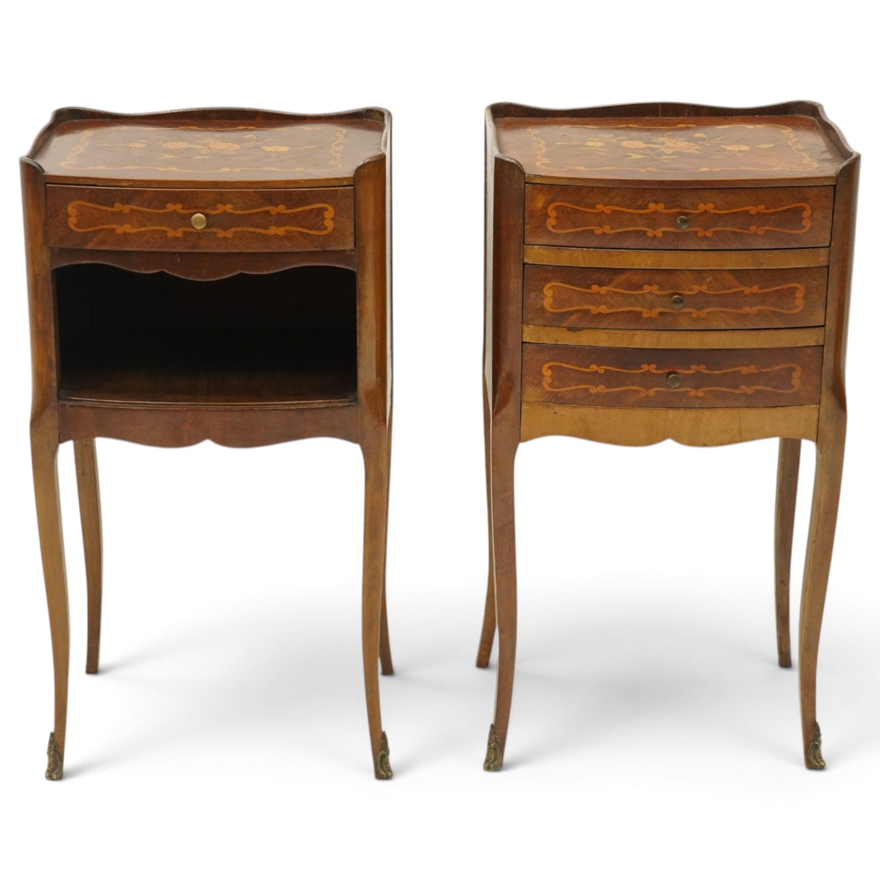 Matched pair of French inlaid floral marquetry bedsides, the three-quarter gallery tray top with central floral bouquet inlay and C-scroll border, one fitted with single frieze drawer over recessed cupboard and shaped apron, the other with three drawers, raised on tapering cabriole supports, with brass cartouche feet