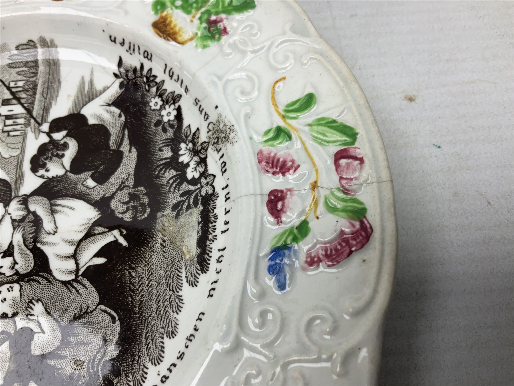 Collection of 19th century William Smith & Co nursery plates, to include examples decorated in the pastime series, and similar, all with moulded floral borders