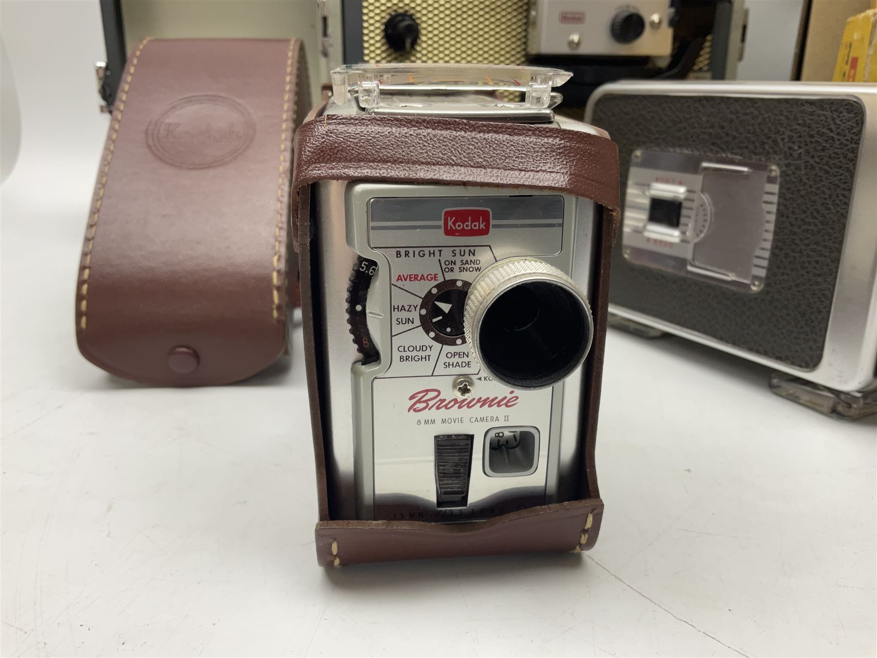 Bolex Paillard P3 Zoom Reflex camera body, serial no 38090, with 'B te S.G.D.G Som Berthiot Pan-Cinor 1:1.9 f=8a 40' lens, serial no. 40251438 in case, Kodak Brownie movie camera, Kodak model 2 Brownie movie camera and a Kodak 8 Movie Projector A-15G and other camera equipment 