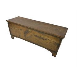 Oak six plank boarded blanket box, hinged lid enclosing candle box, the front with applied mouldings, on bracket feet 