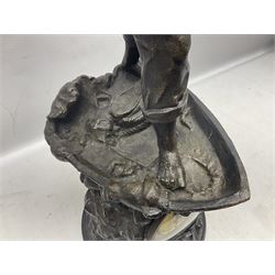 Early 20th century spelter effect figure of a sailor standing in the bow of a boat scanning the horizon, on a simulated rock base with a plaque entitled 'Rescue', base fitted with a timepiece clock movement and two-part dial, with pierced hands, gilt dial centre and ivorene chapter ring written in Arabic numerals, German HAC spring driven going barrel movement wound from the front; with pendulum H65.5cm
