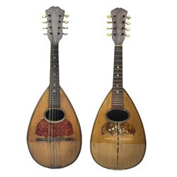 Late 19th century Italian lute back mandolin with segmented bowl back, bears label Gennaro Maglioni Napoli L61cm; in ebonised wooden case; together with another similar damaged Italian lute back mandolin for restoration or spares (2)