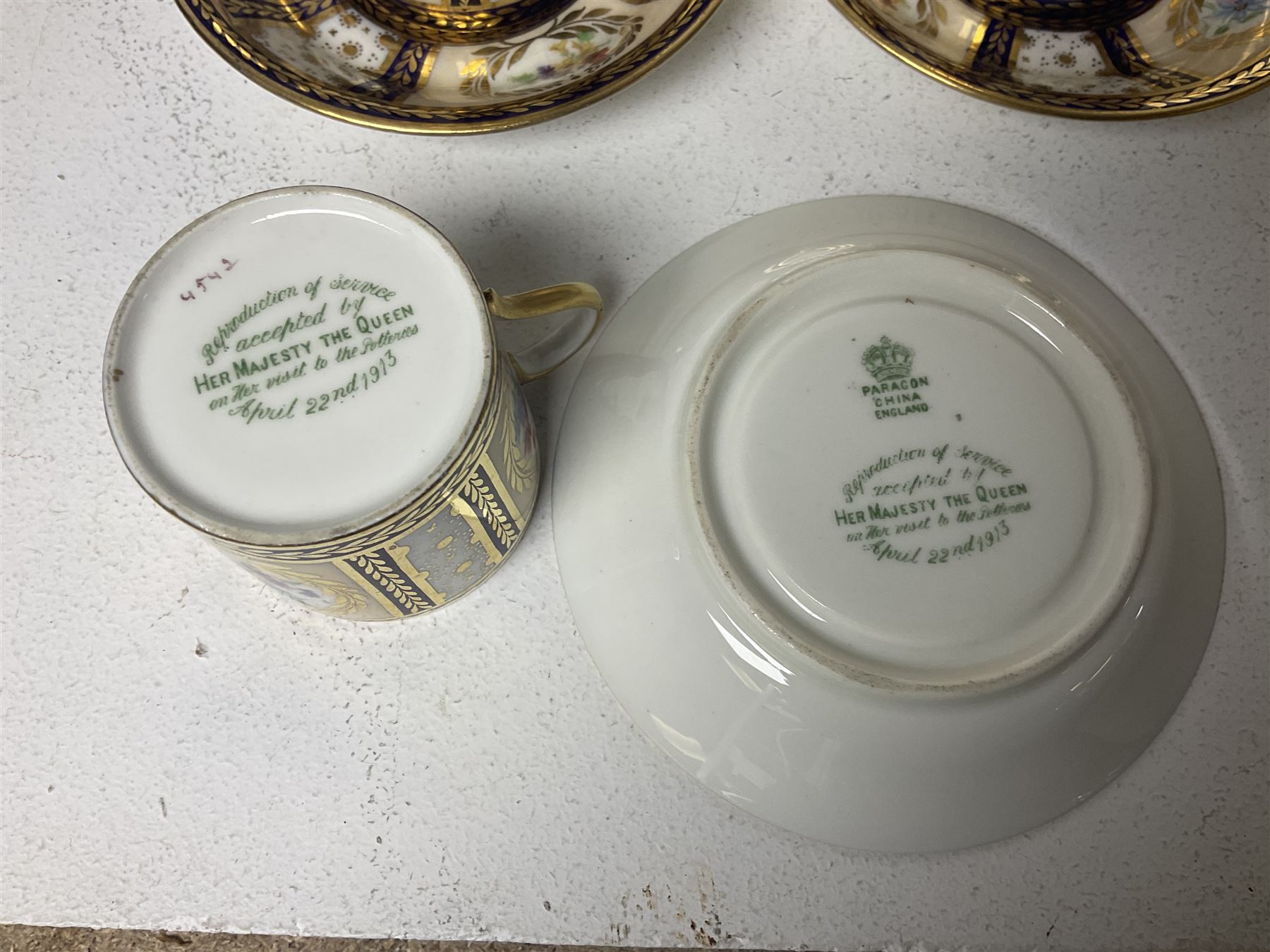 Paragon thee coffee cans and saucers, painted in gilt and colours with flowers, Paragon set of six coffee cups and saucers, 'Reproduction of Service accepted by Her Majesty Queen on her visit to the potteries, with three matching saucers